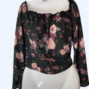 black floral off shoulder blouse w ruffle neckline & bell sleeves. S Love Fire
